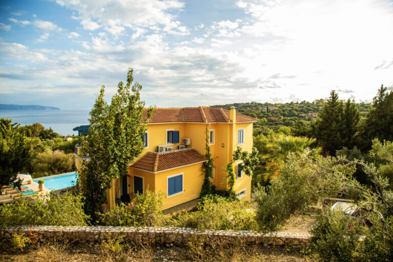 Villa set in green gardens near the sea