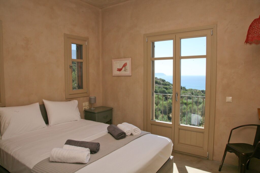 Bright retreat bedroom with sea views